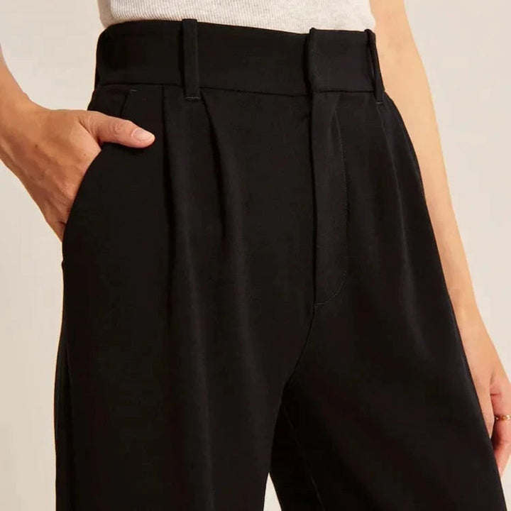 Lily – Pantalon large taille haute avec design plissé et poches latérales