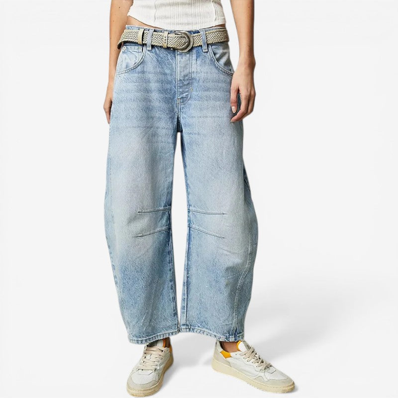 Pantaloni in denim a gamba larga alla caviglia con chiusura a zip
