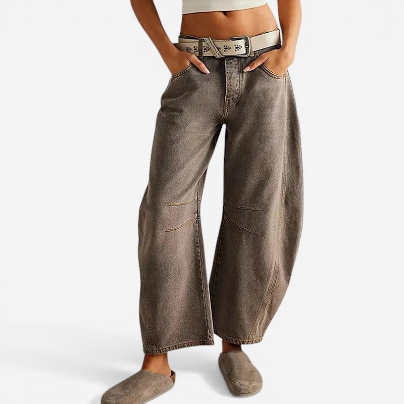 Pantaloni in denim a gamba larga alla caviglia con chiusura a zip