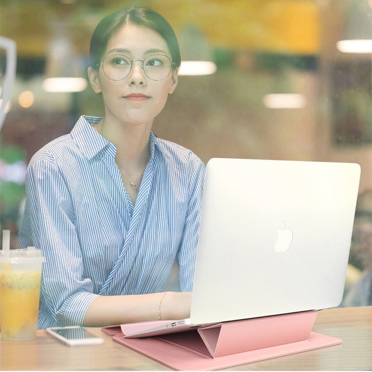 FlexiGuard - Husă multifuncțională pentru laptop cu suport încorporat și sprijin pentru încheietură