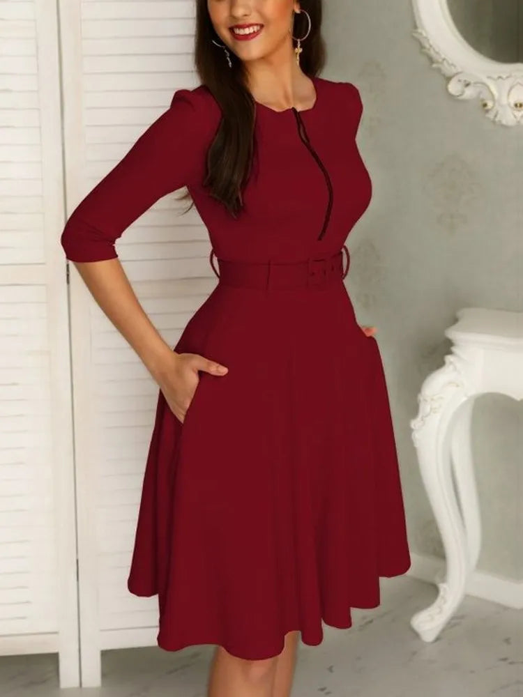 Mirella - Élégante robe midi à manches courtes et encolure ronde