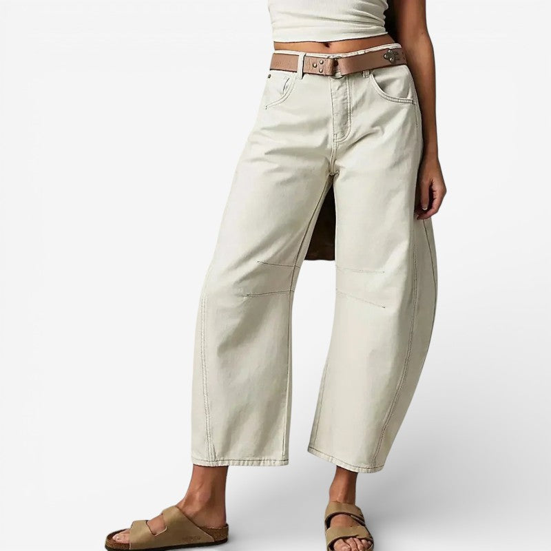 Pantaloni in denim a gamba larga alla caviglia con chiusura a zip