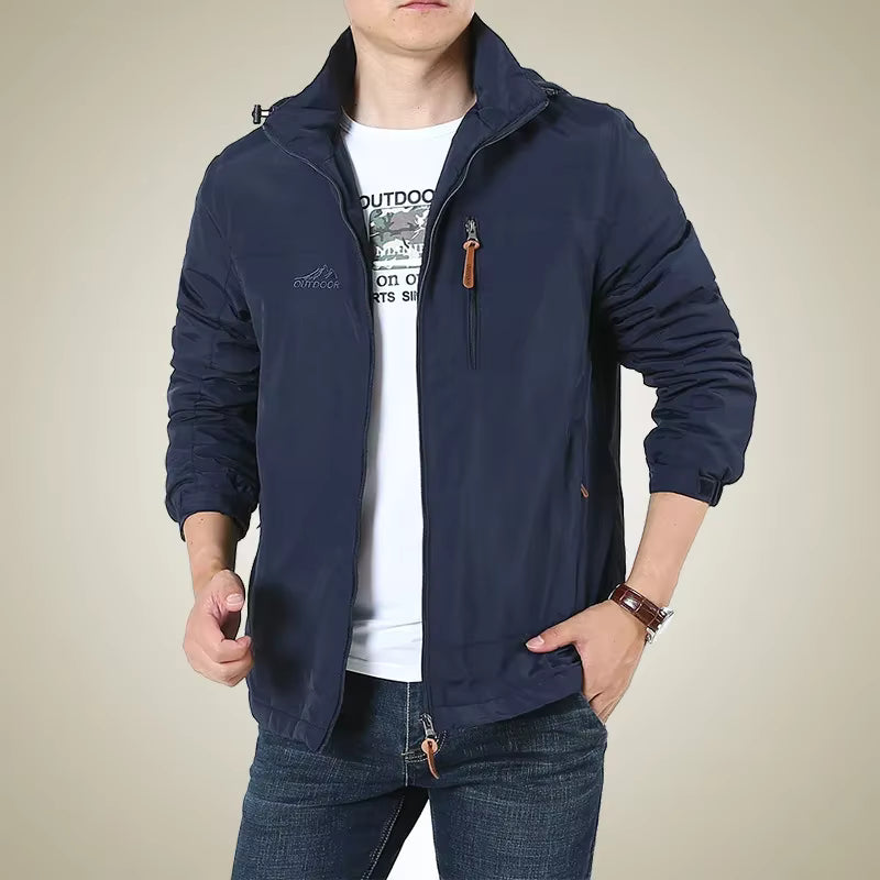 Logan – Veste d’Extérieur avec Capuche, Fermeture Éclair et Plusieurs Poches