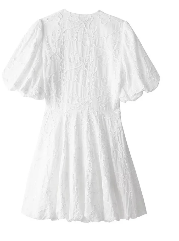 Amelia - Robe blanche élégante avec une touche chic et ludique
