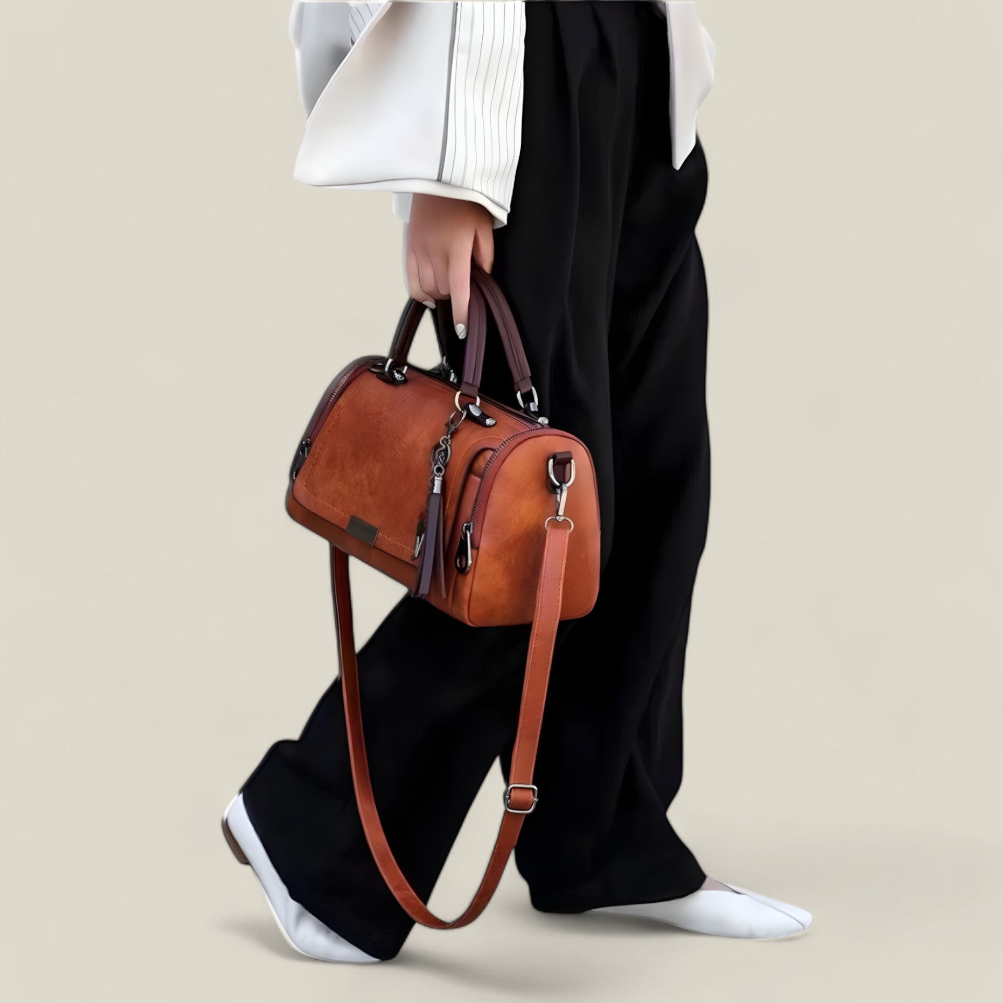 Celeste - Chic borsa a tracolla con trendy nappina e tracolla regolabile