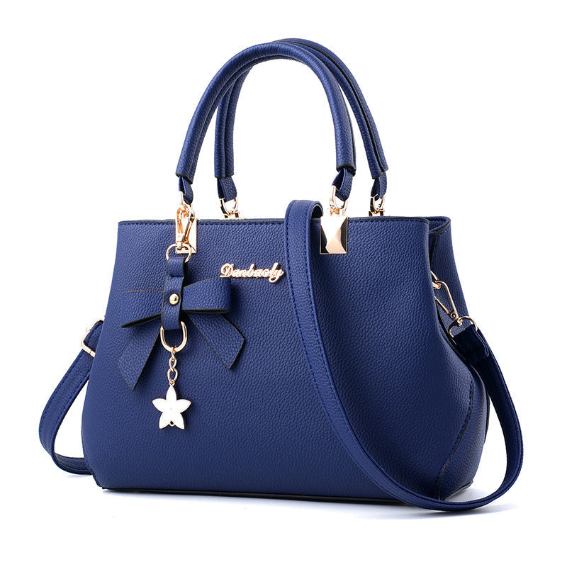 UrbanCharm - Elegante grande borsa a spalla con dettaglio a stella e tasche multiple