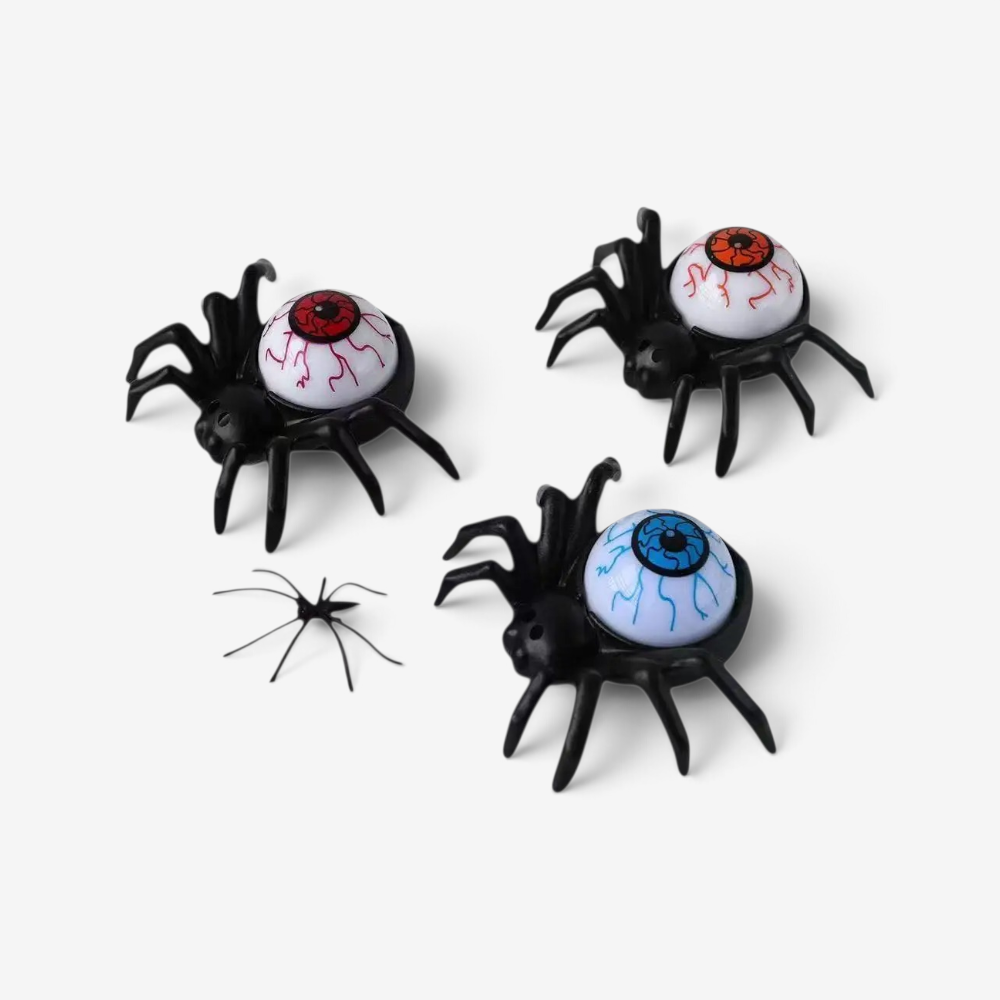 Halloweenové svícny s pavouky a dekorativními motivy