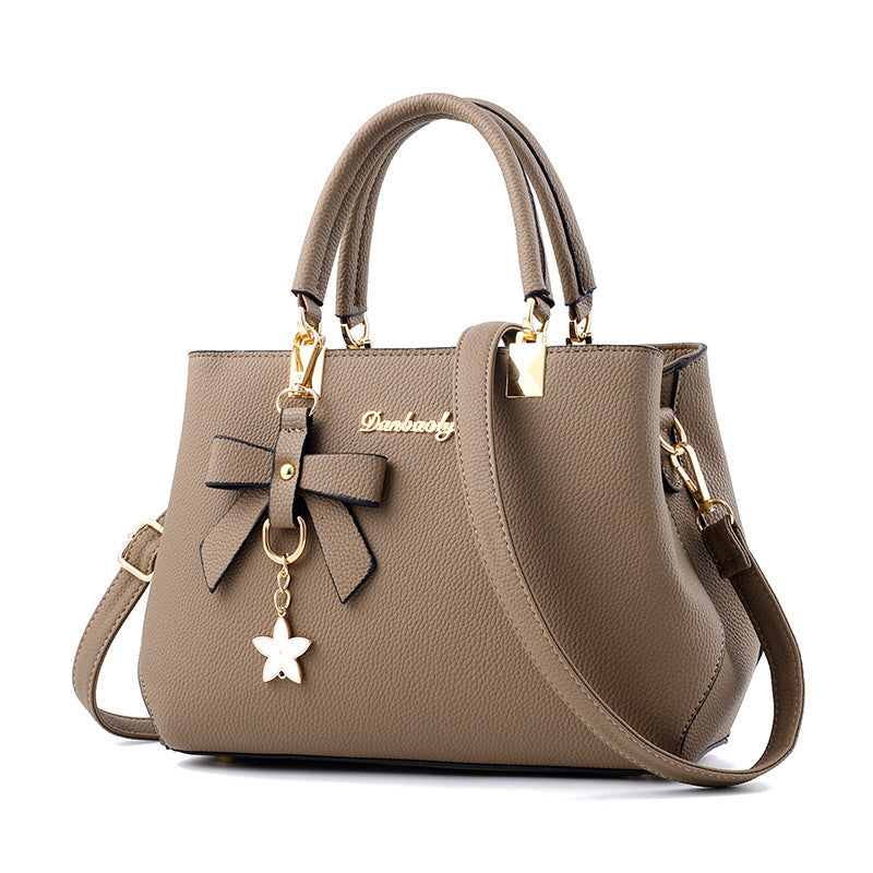 UrbanCharm - Elegante grande borsa a spalla con dettaglio a stella e tasche multiple