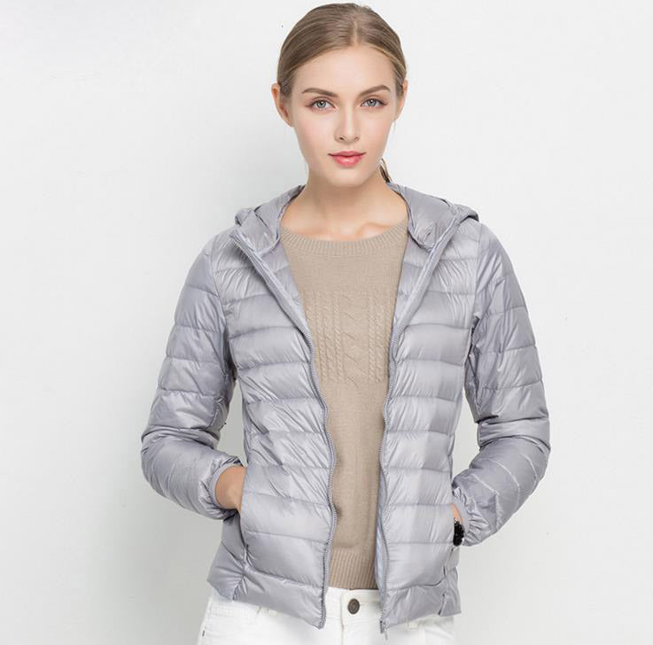 Lena – Stylish lightweight puffer coat with hood and front zipper for everyday wear