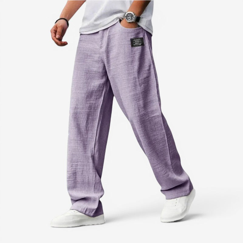 Pantaloni bărbătești cu croială largă și buzunare laterale