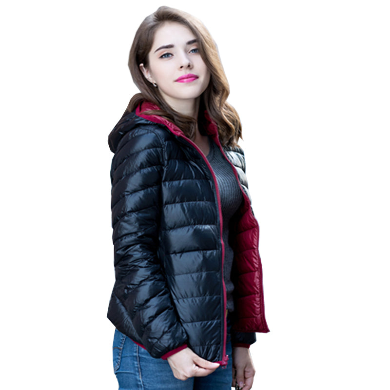 Rena – Giacca imbottita leggera con cappuccio, chiusura frontale con zip e design isolante