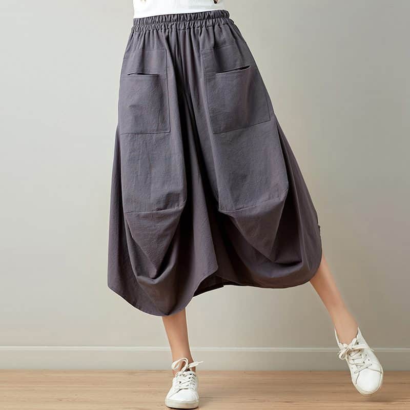 Mira – Pantaloni relaxați drapați cu buzunare practice și siluetă fluidă