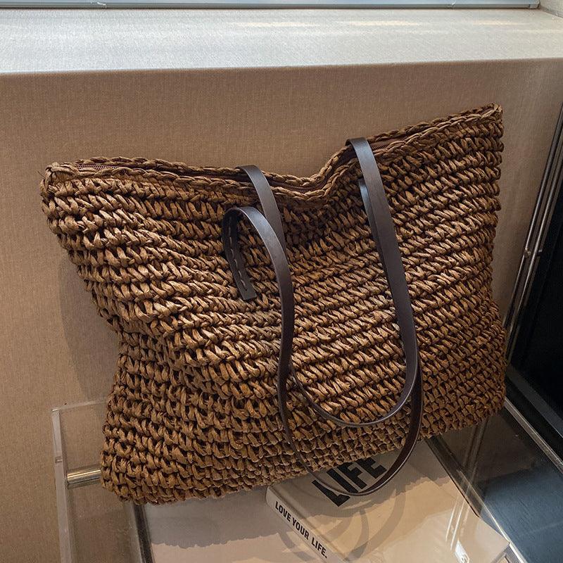 Luna - Handmade Bohemian beach bag with spacious interior and playful tassel accents